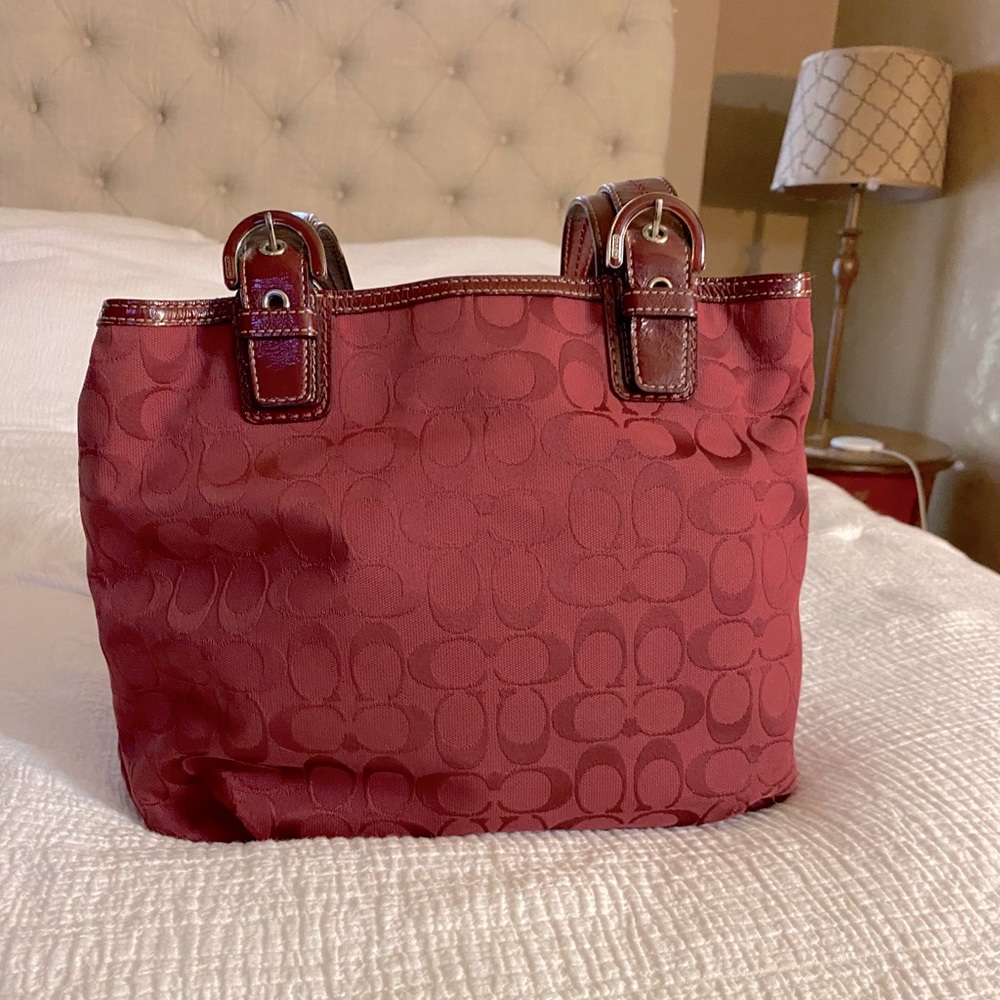 Coach signature print buckle handle tote
